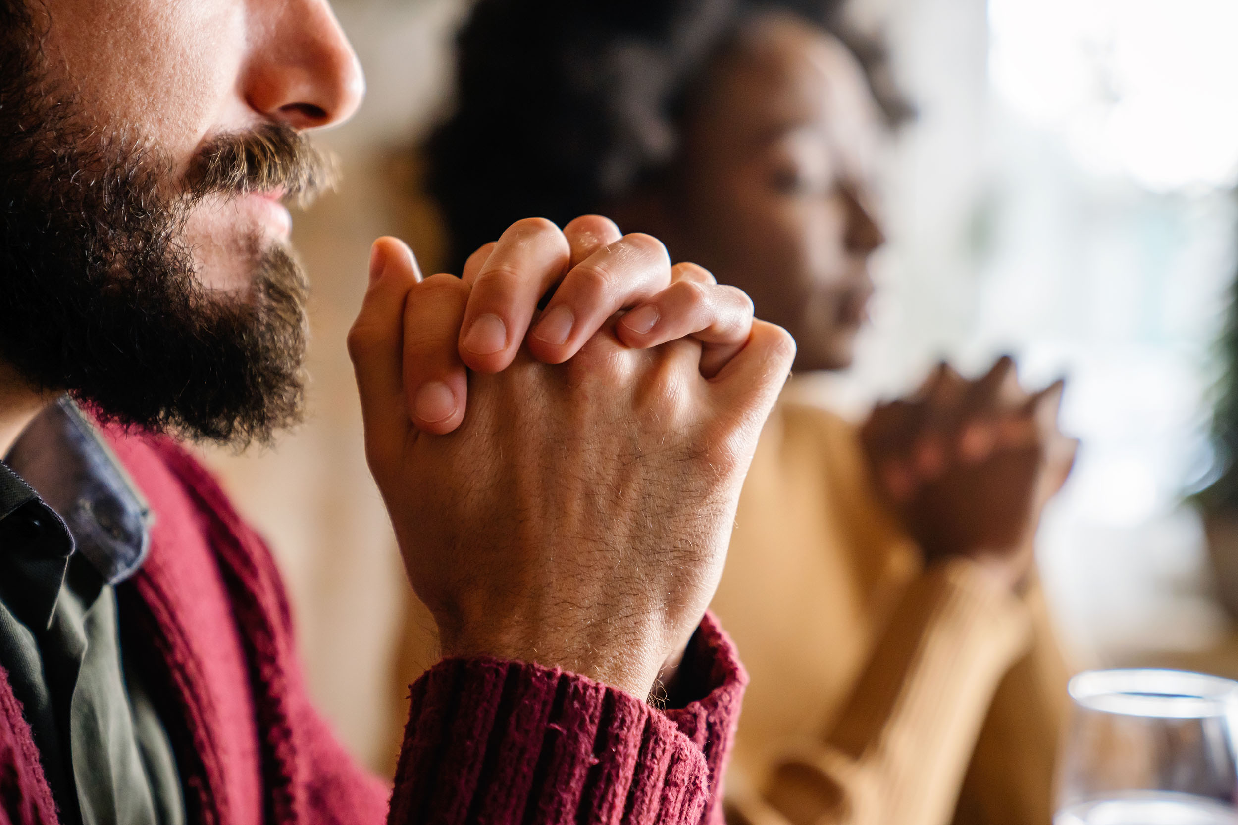 Members of The Church of The Cross fulfilling prayer request by praying